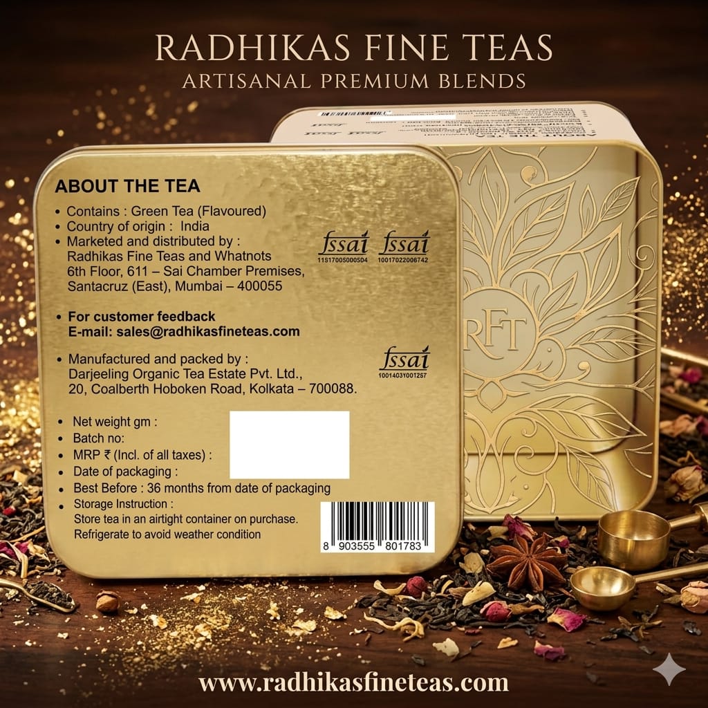 Gold tea box with detailed text and branding for Radhikas Fine Teas on a wooden background with tea leaves and a teacup.