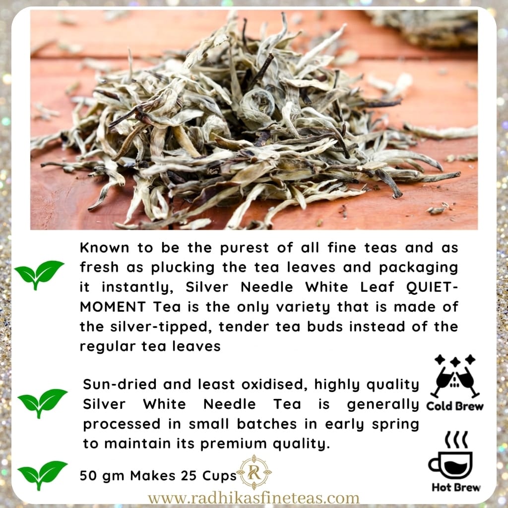 Silver Needle White Leaf Quiet Moment tea on a wooden surface with text about the tea's qualities.