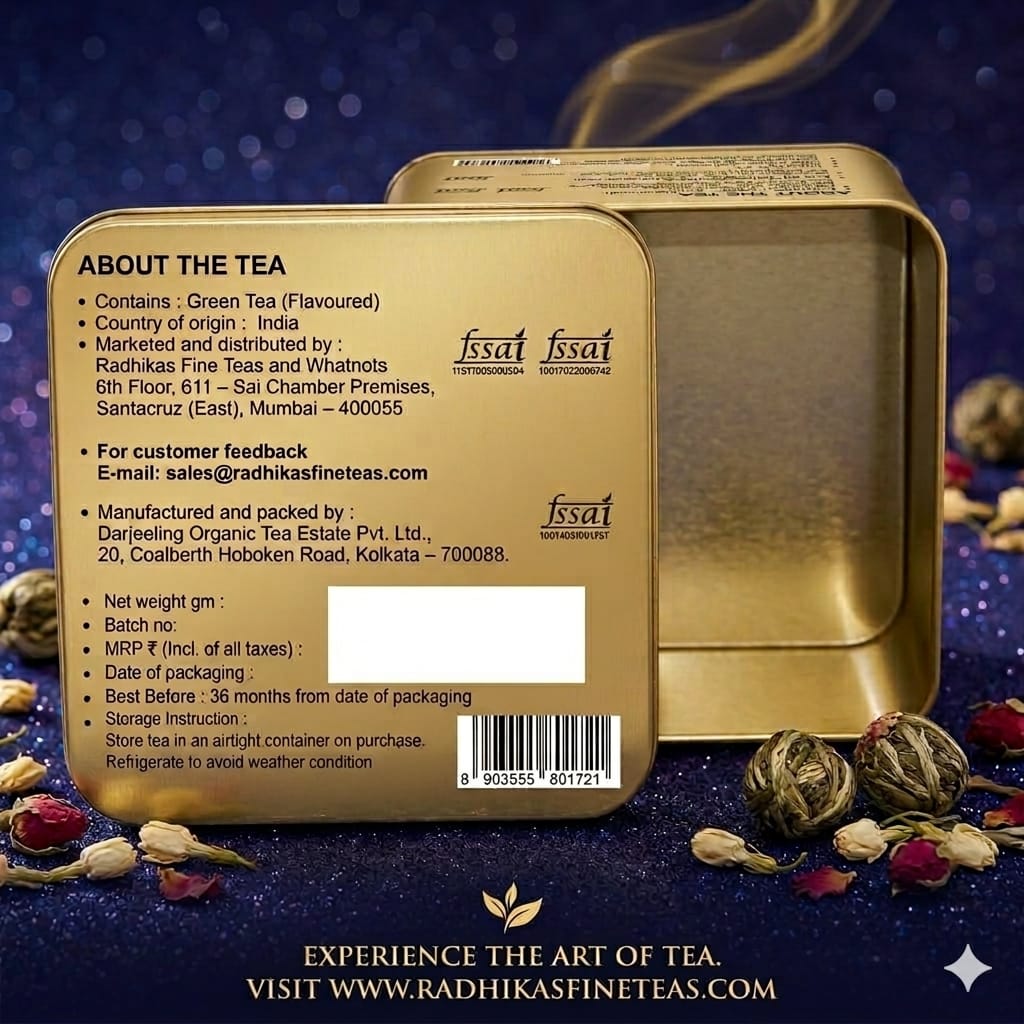 Gold tea tin with tea leaves and a dark blue background