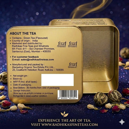 Gold tea tin with tea leaves and a dark blue background