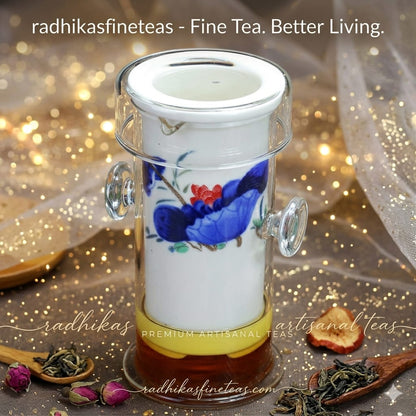 Decorative tea infuser with floral design on a glittery background, featuring 'radhikasfineteas' branding.