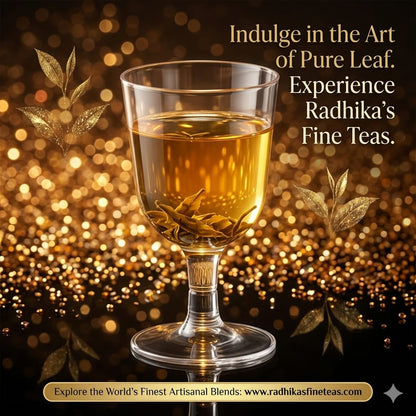 Glass of tea with gold leaves on a dark background with text promoting Radhika's Fine Teas.
