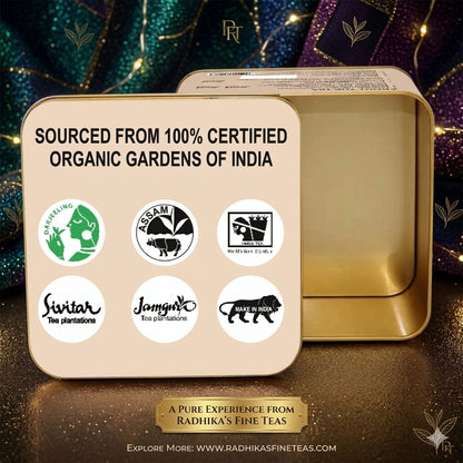 Gold tea tin with certification logos and Radhika's Fine Teas branding on a decorative background.