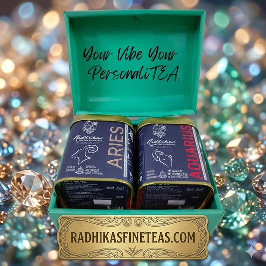 Tea set with 'ARIES' and 'AQUARIUS' labels in a decorative box with gemstone background.