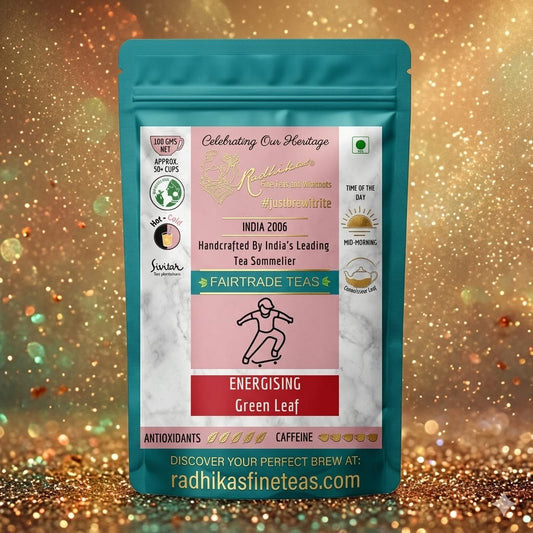 Tea package with a colorful label on a glittery gold background